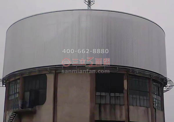湖北荊州江陵圓型水塔三面翻弧形廣告牌案例施工圖片